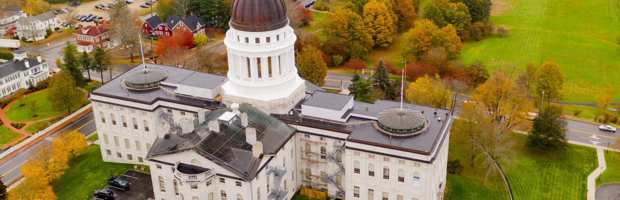 Close to the peak of fall color in the leaves at the State House of Main in Augusta USA